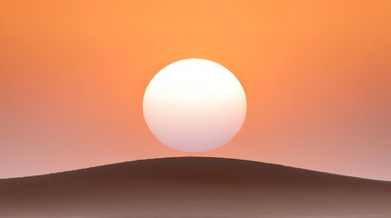 Fototapeta premium A desert landscape with a large white ball in the middle of it