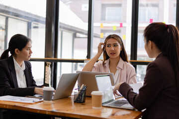 Asian businesswoman teamwork working on laptop with finances analysis report at desk in office, business financing, accounting banking, Team of creative and business planning, 