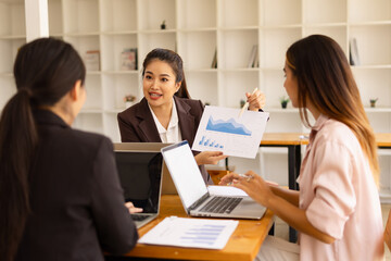 Asian businesswoman teamwork working on laptop with finances analysis report at desk in office, business financing, accounting banking, Team of creative and business planning, 