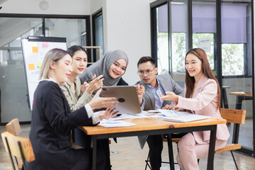 Team of Asian business people and working together in office, Startup projects and business presentation at meeting room.