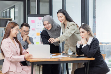 Team of Asian business people and working together in office, Startup projects and business presentation at meeting room.