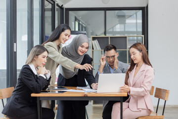 Team of Asian business people and working together in office, Startup projects and business presentation at meeting room.