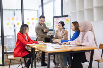 Team of asian business working with finances analysis report meeting in office, business financing, accounting banking, Business teamwork, Team of creative asian business meeting and business planning