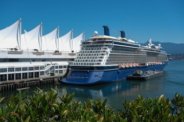 Modern Celebrity cruiseship cruise ship ocean liner sail away departure from port of Vancouver,...
