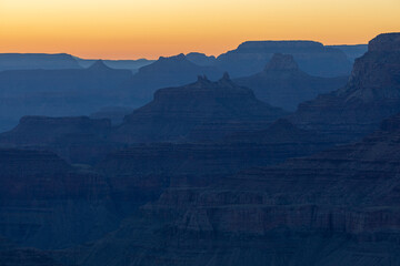 Sunset silhouettes from Navajo Point in Grand Canyon National Park, Arizona. High quality picture for download.
