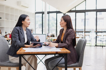 Two businesswoman working with analysis data investment plan, Business startup and marketing presentation,