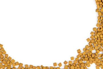 dry pet food isolated on white background. close up. top view. blank for designers