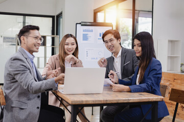 Asian business teamwork working with analysis report and advisor showing plan, Financial analysis and Marketing teamwork concept.
