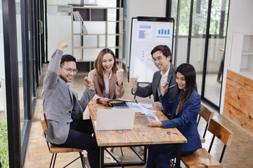 Asian business teamwork working with analysis report and advisor showing plan, Financial analysis and Marketing teamwork concept.