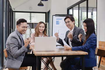 Asian business teamwork working with analysis report and advisor showing plan, Financial analysis and Marketing teamwork concept.