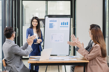 Asian business teamwork working with analysis report and advisor showing plan, Financial analysis and Marketing teamwork concept.