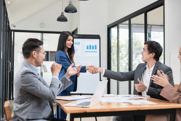 Asian business teamwork working with analysis report and advisor showing plan, Financial analysis and Marketing teamwork concept.