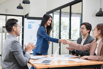 Asian business teamwork working with analysis report and advisor showing plan, Financial analysis and Marketing teamwork concept.