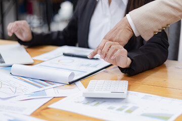Hands of business working on a calculator at desk in office, Business accounting concept,