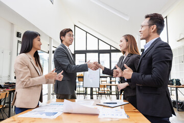 Asian business teamwork working with analysis report and advisor showing plan, Financial analysis and Marketing teamwork concept.