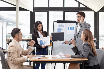 Asian business teamwork working with analysis report and advisor showing plan, Financial analysis and Marketing teamwork concept.