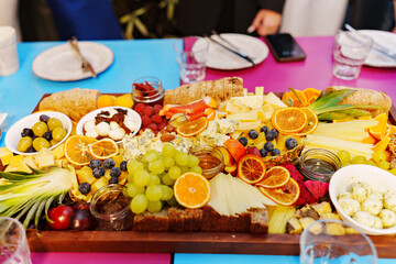A large fruit platter with exotic berries and fruits. 