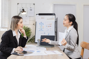 Two businesswoman working with analysis data investment plan, Business startup and marketing presentation,