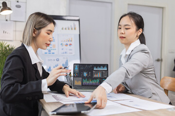 Two businesswoman working with analysis data investment plan, Business startup and marketing presentation,