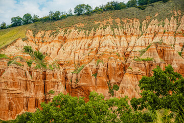 Red rocky slopes Rapa Rosie is a protected geological and floristic reservation area near Sebes alba in Romania