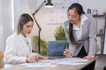 Two businesswoman working with analysis data investment plan, Business startup and marketing presentation,