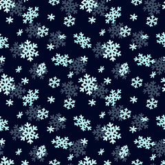 Seamless pattern with freely flying and falling snowflakes in dark blue background. Decorative festive ornament in cartoon stile for wrapping paper, wallpaper, covers and winter textile