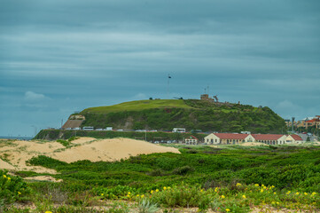 Nobbys Lighthouse is an active lighthouse established on Nobbys Head in Newcastle in 1854 to guide vessels into the Hunter River