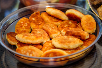 A plate full of potato pies