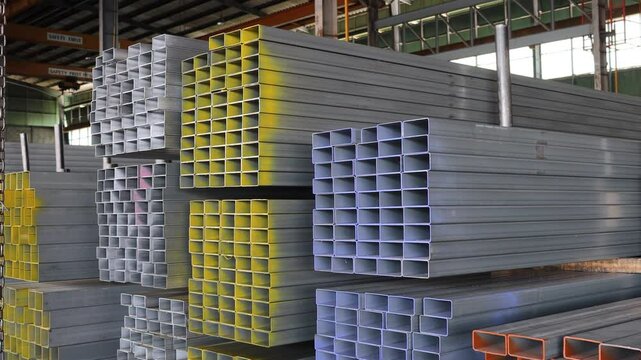high quality Galvanized steel pipe or Aluminum and chrome stainless pipes in stack waiting for shipment in warehouse