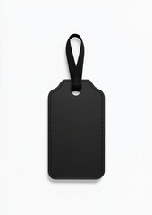 Fototapeta premium A black tag with a black string hanging from it
