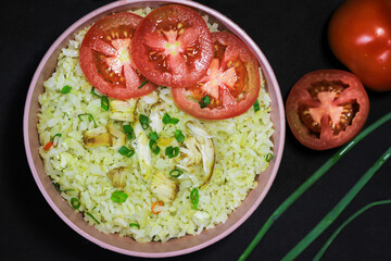 Fried rice or Nasi goreng, traditional frying rice dish from indonesia made of Precooked rice fried in a small amount of oil	
