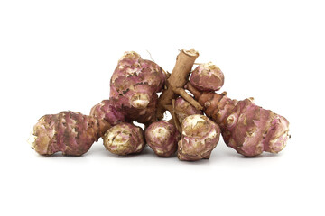 Fresh raw Jerusalem artichokes isolated on white background