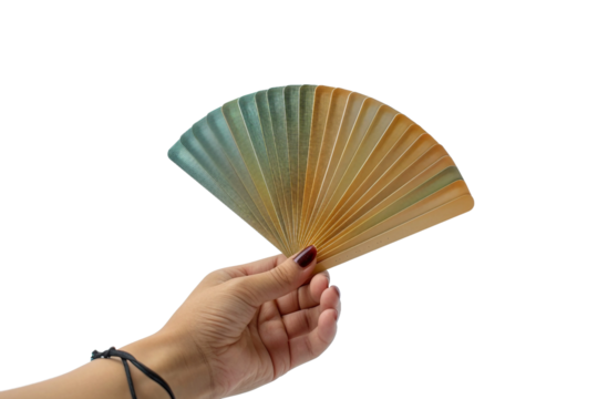 Hand holding fanned playing cards isolated on transparent background for gaming concept