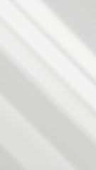 Fototapeta premium Beautifully lit gray background with soft shadows perfect for product presentation, lights, commercial use