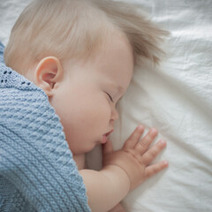 close-up portrait of a sleeping boy 6-12 months