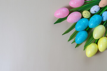 Flowers on grey background. Easter top view postcard with copy space