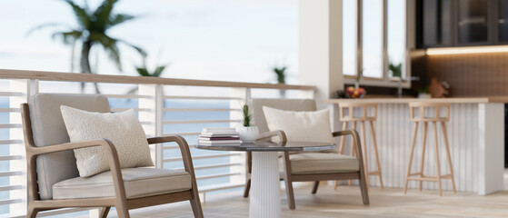 A contemporary lounge or a cafe features a comfortable seat by the railing with a beautiful sea view