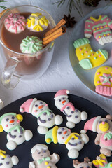 Christmas marshmallows. Winter candy. Sweet food in december. Snowman and Santa Claus.