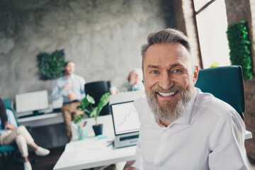 Photo of coworking project teamwork people senior man boss smile work together conference meeting...