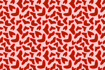 Obraz premium A playful pattern of red hearts on a soft pink background showcasing love and warmth