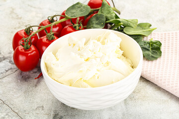 Soft cream cheese in the bowl