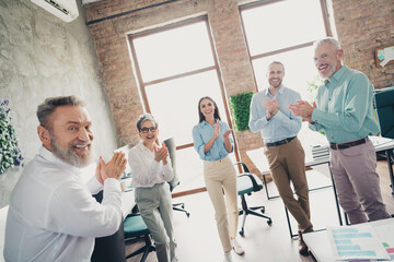 Photo of teamwork people working together congratulation applause promotion comfortable modern office loft room interior indoors workspace