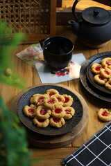Thumb print cookies with strawberry jam