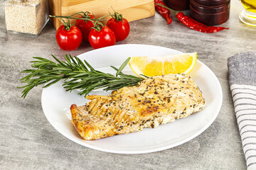 Baked salmon fish served rosemary