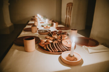 Medieval Banquet Room with Candlelit Long Dining Table