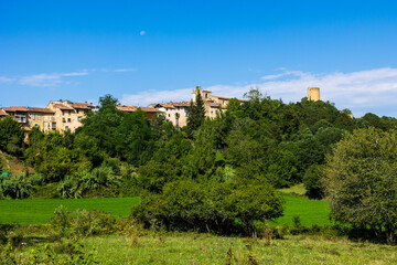 Obraz premium Medieval Village of Aurignac, Dominated by its Castle