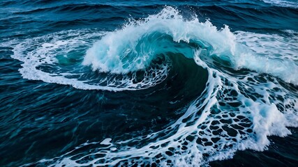 Aerial Views of Ocean Waves Breaking with Clear Blue and Turquoise Water, Featuring White Foam and Dynamic Splash Patterns