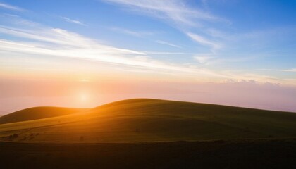Obraz premium a hill with a sunset in the background