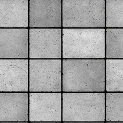 A patterned arrangement of grey and white square tiles, featuring a grid layout with a mix of light and dark shades.