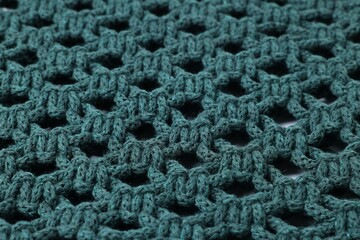 Handmade macrame shopping bag as background, closeup